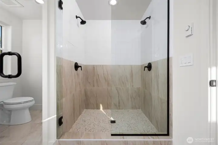 Upper primary bathroom features dual headed shower