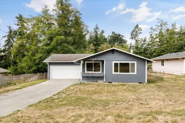large front yard set back from the street