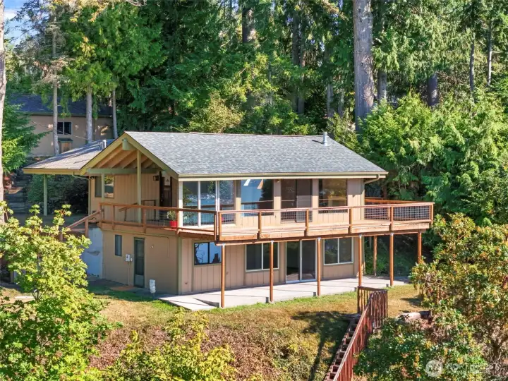 Rear of Home with view Deck and Patio