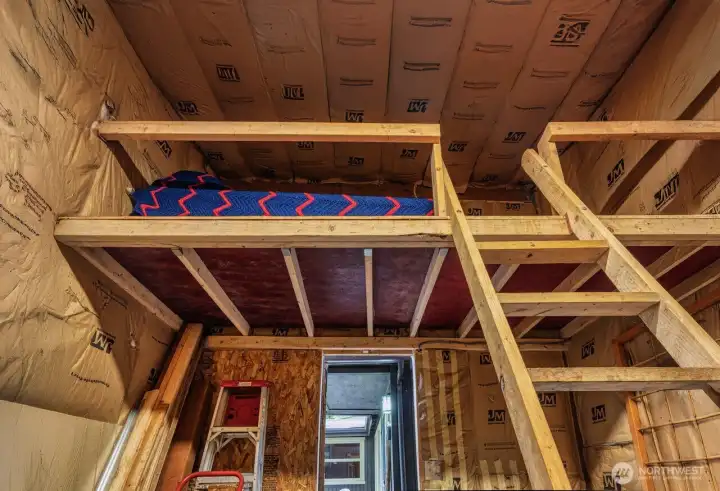 Overhead storage could double as bunk space.