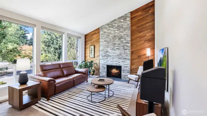 Nature and comfort combined – expansive windows bring the outdoors in, balanced by cozy finishes.