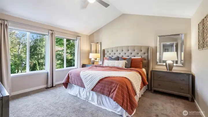 Retreat to this spacious primary suite designed for rest and relaxation