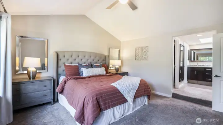 With vaulted ceilings & plenty of natural light this space blends comfort, light & privacy.