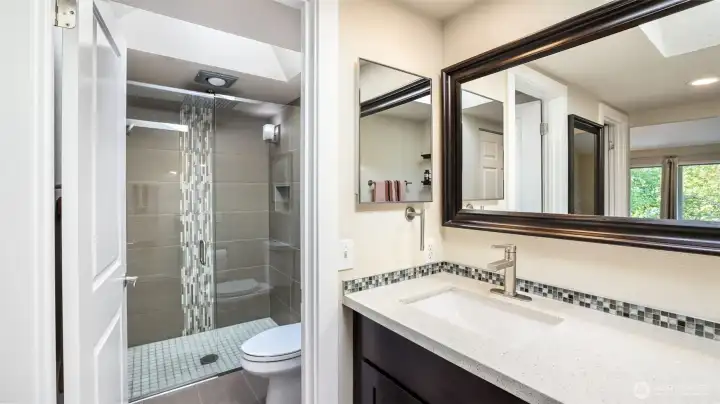 enjoy the convenience of a private water closet in this primary ensuite.