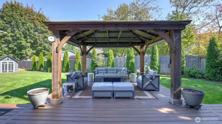 Your backyard retreat – enjoy year-round comfort with a spacious gazebo lounge