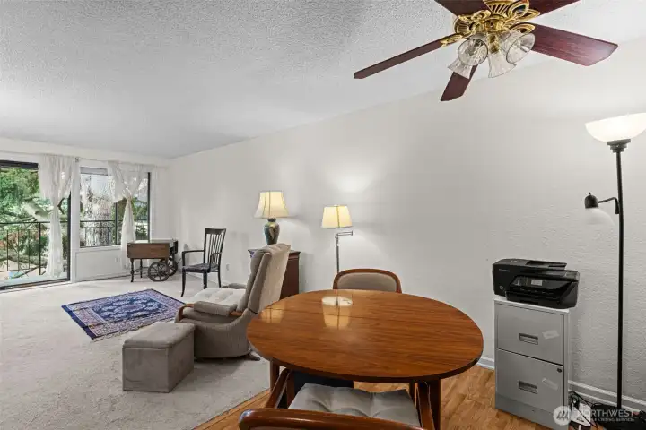 The living room and dining room are divided only by the floor, creating a nice, open feel.