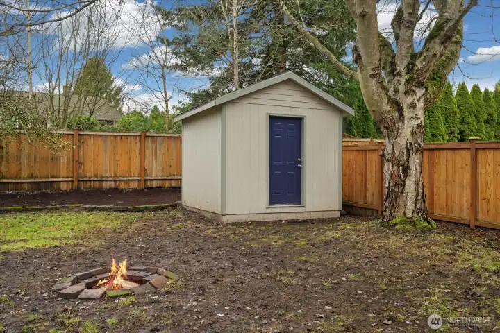 Large shed is an added amenity for storing tools, and gardening supplies!