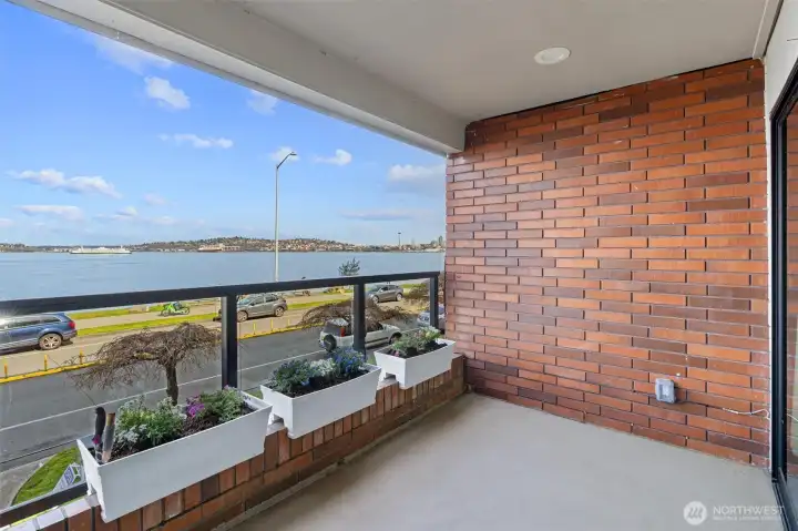 The view deck is conveniently accessible from both the living room and the primary suite, creating a seamless indoor-outdoor flow. This thoughtful design allows for easy entertaining from the main living space while also offering a private retreat directly from the primary suite, perfect for enjoying morning coffee or unwinding with evening views.