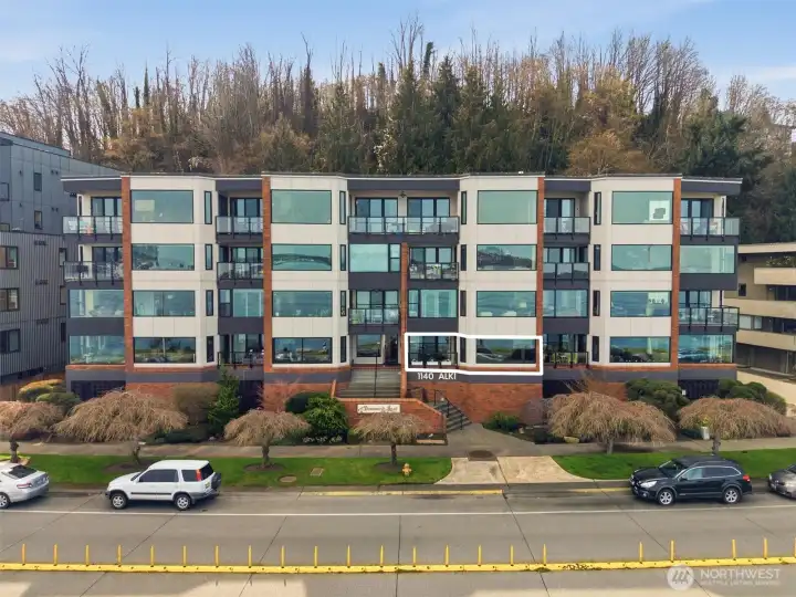 The white outline in this photograph highlights the precise location of our first-floor unit within the Duwamish Head Condominiums, offering a clear visual reference of its position in the building.