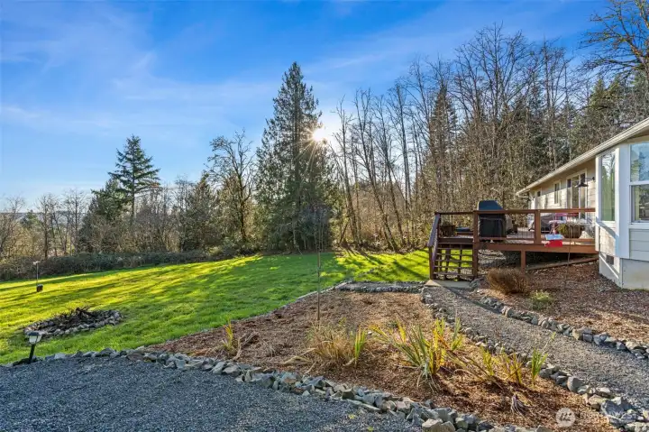 Large gravel pad allows for lots of parking, RV parking and space to build a shop!