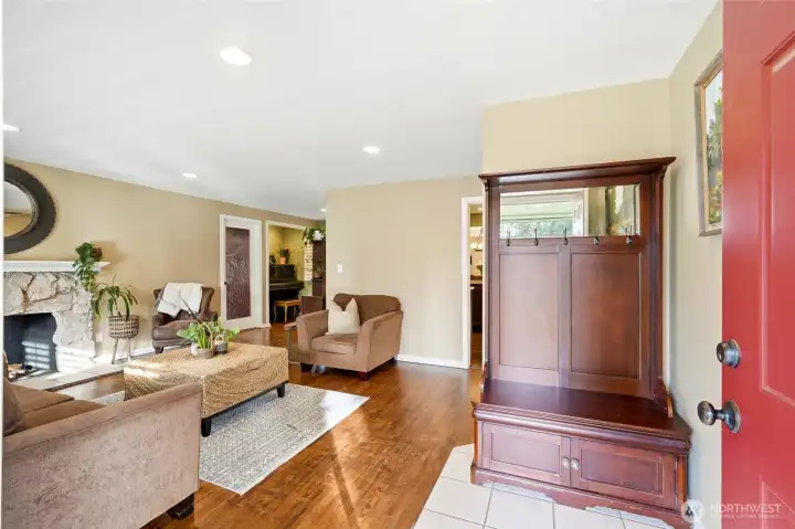 The front door leads you into a bright living room.