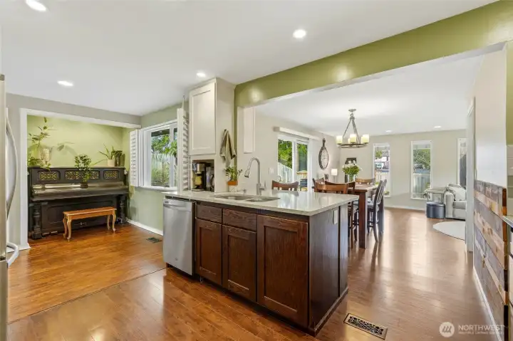 Kitchen flows directly into the dining nook and dining room.