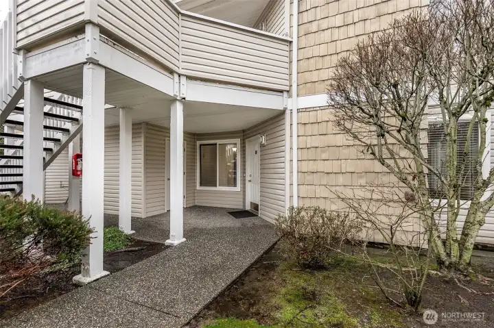 Walkway to Front Entrance with Private Covered Patio & Storage Room
