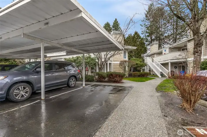 Assigned Covered Parking Space Right In Front of Unit with a Paved Walkway with No Curbs
