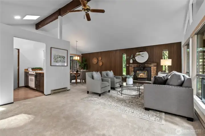 Vaulted ceilings with exposed beams add architectural interest.