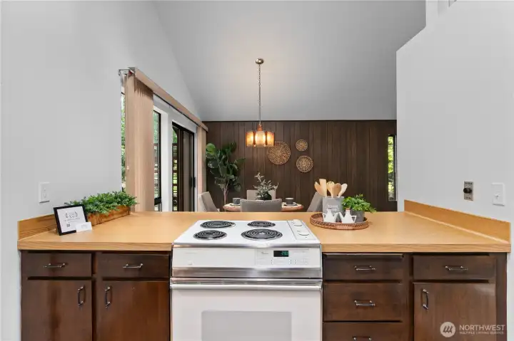 Additional prep and seating space for casual dining.