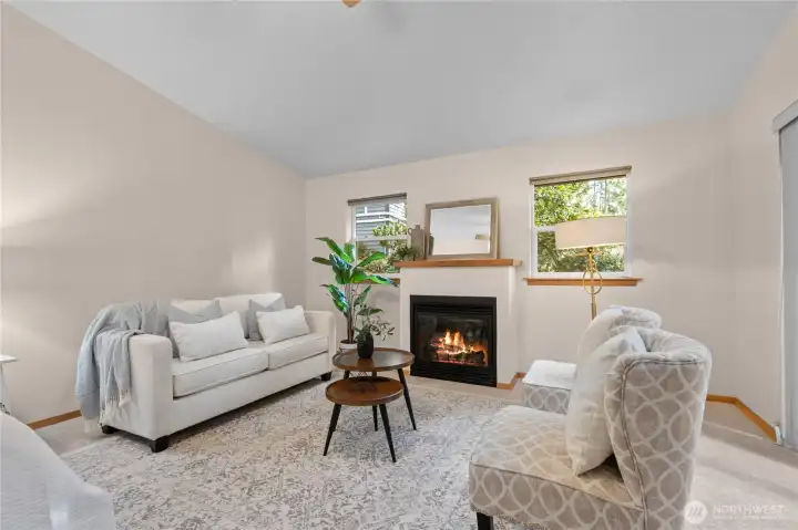 Flexible bonus/living area with fireplace for added comfort.