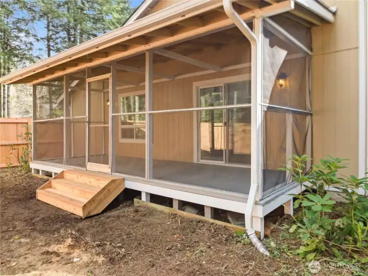 SCREENED PORCH - Off Dining Area /Living Rm. Front yard on left.