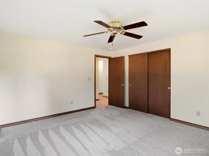 BR#3 - Ceiling Fan and Closet. Hallway beyond to Kitchen.