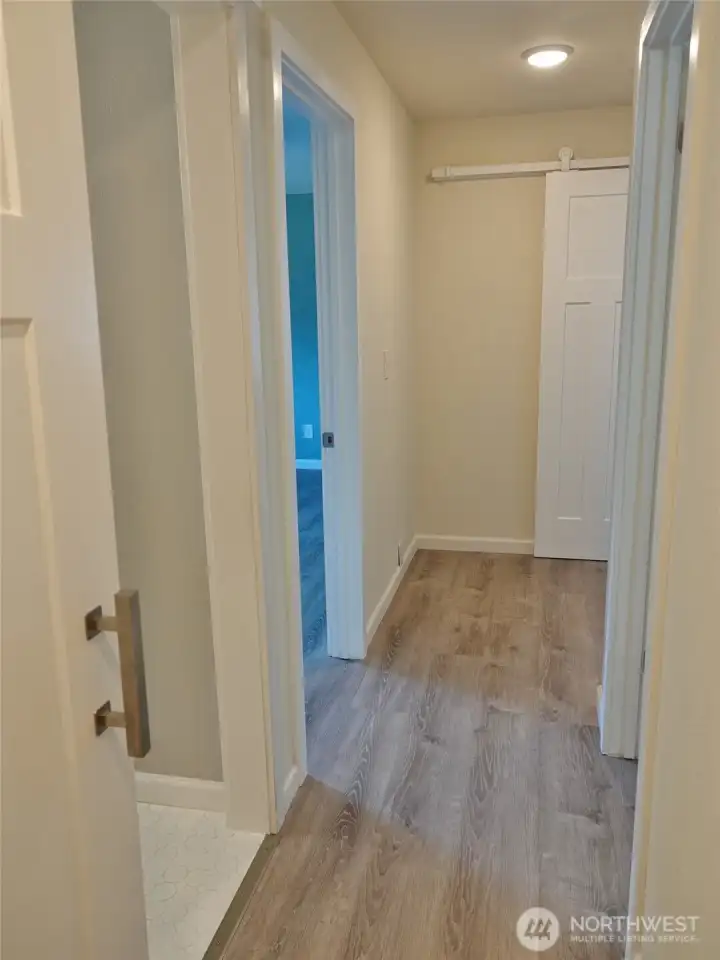 Hallway leading to the bedrooms and bathrooms.