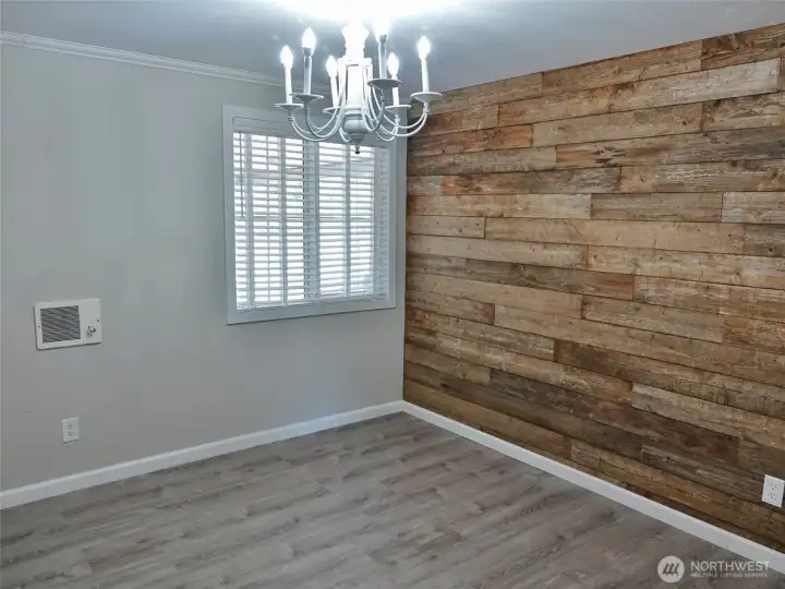 1st Guest Bedroom w/ a unique reclaimed wood wall.