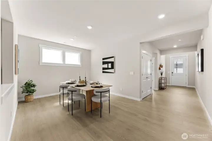 Well-lit entry, and formal dining area