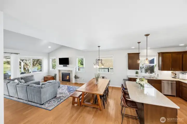 Bright, open & great for entertaining- kitchen nicely opens to the dining room & family room with vaulted ceilings.