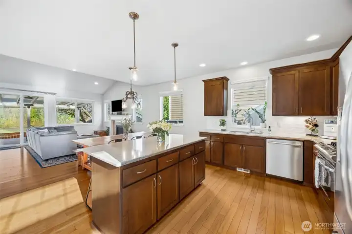Kitchen island offers a nice breakfast bar & faces the family room not to miss a beat of the conversations. NEW Bosch dishwasher.