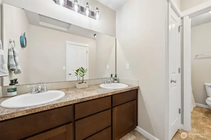 Main guest hallway bathroom is located upstairs.