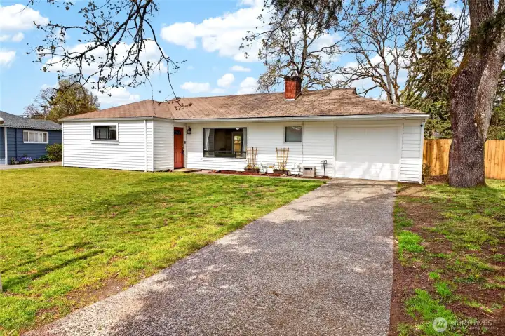 Front view of this charming 1 level rambler in Lakewood town center ready to sell
