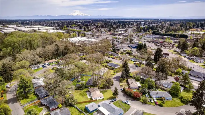 Aeiral view of this one level home in the city with large private fully fenced lot minutes to everything