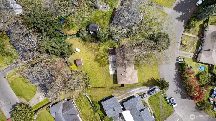 Second view from the sky of your large private home and lot in cul de sac ready for lots of fun in the back yard.