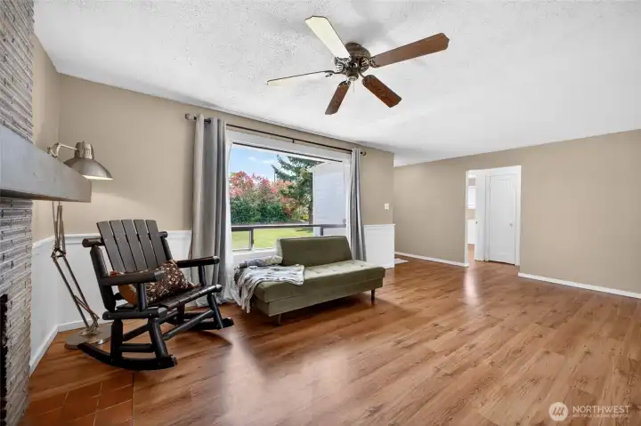 Well cared for and cheery family room.  Home has radiant heated flooring throughout to keep your feet warm