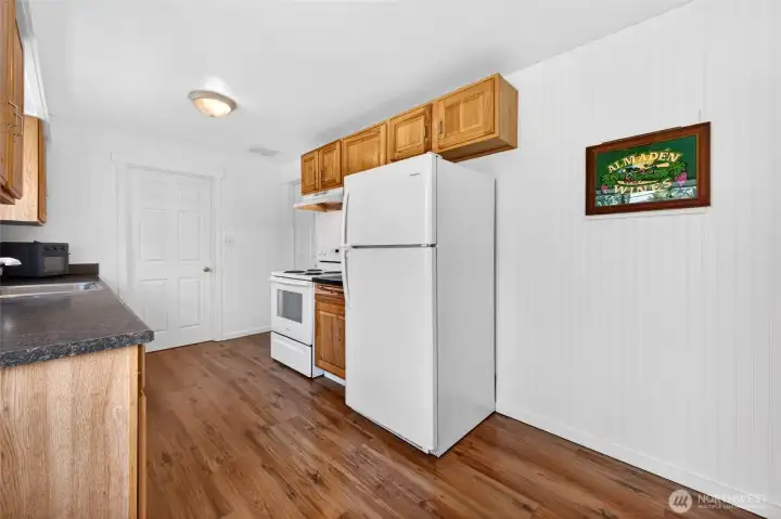 More low maintenace laminate flooring in kitchen