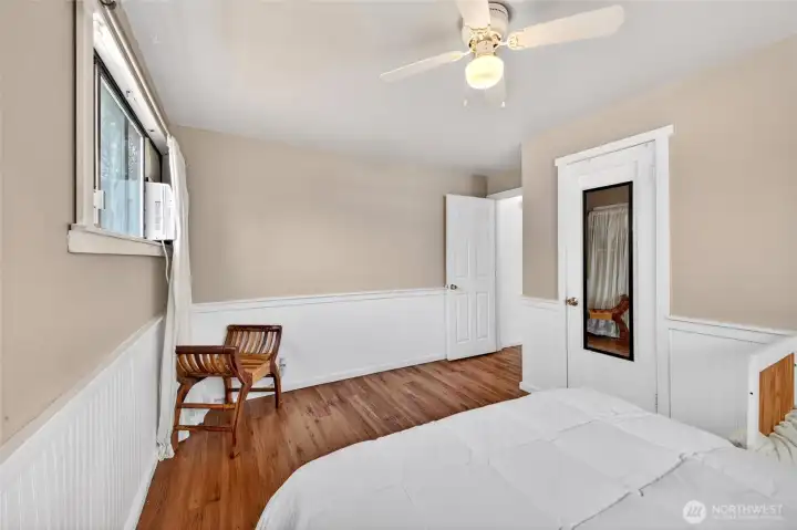 Good sized bedroom number 1 being used as primary room wtih closet and ceiling fan