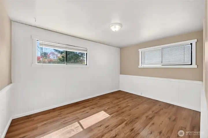 Second bedroom view with more earth tone colors and lots of light