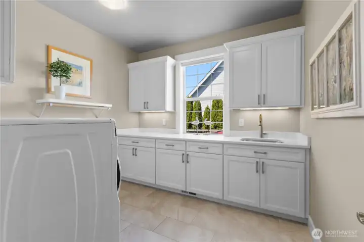 Generous Laundry Space with Lots of Storage and Sink