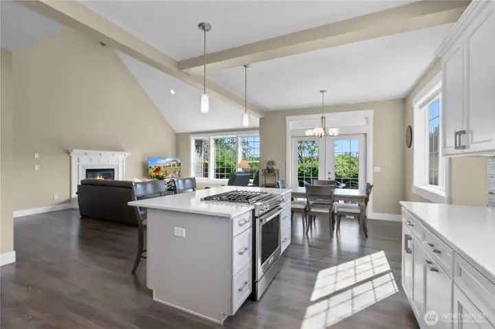 Natural Gas Stove for Responsive Cooking Experience - Downdraft Fan Retracts to Maintain Open Feel
