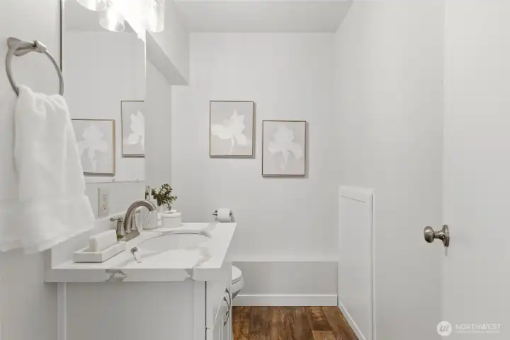 Half bathroom located on the bottom floor.