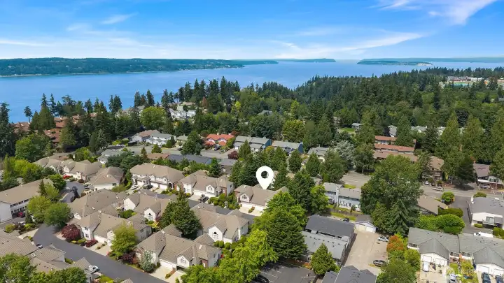 Aerial view facing Northeast showing prime location.
