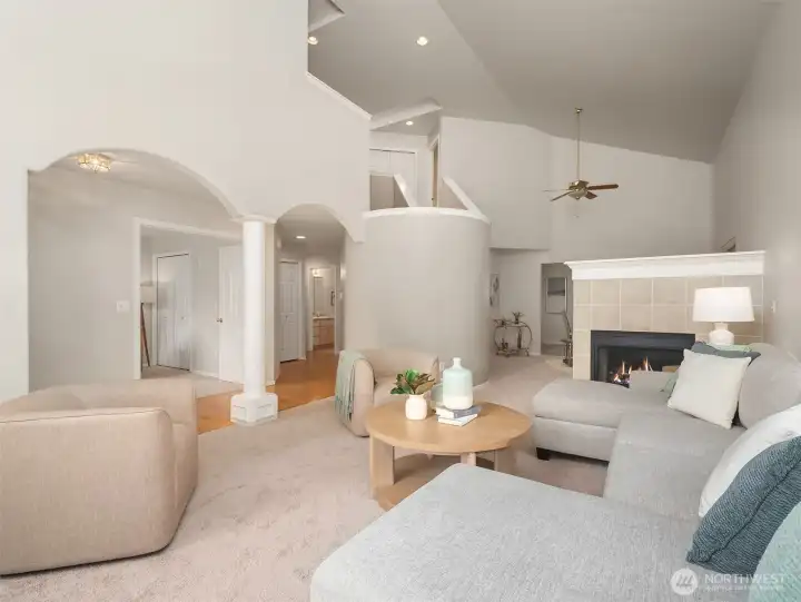 Open concept living area between living & family room.