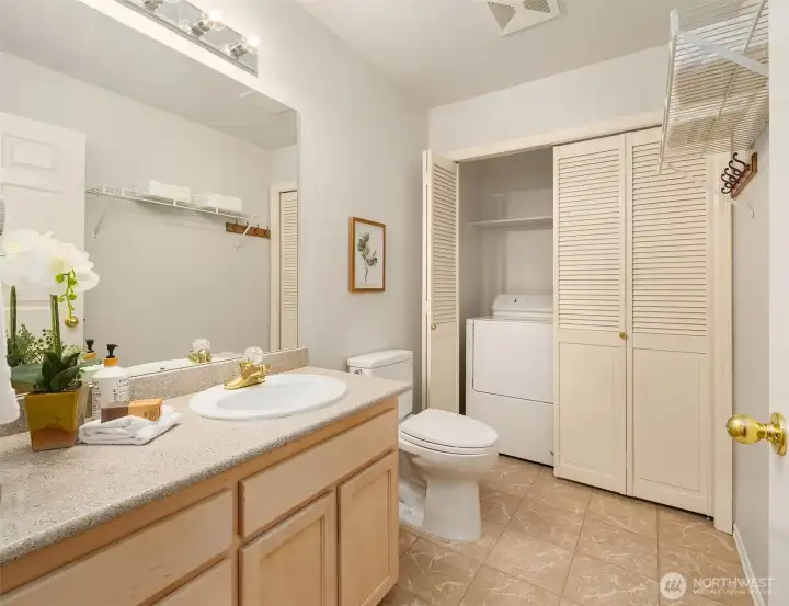 Powder bathroom & laundry.