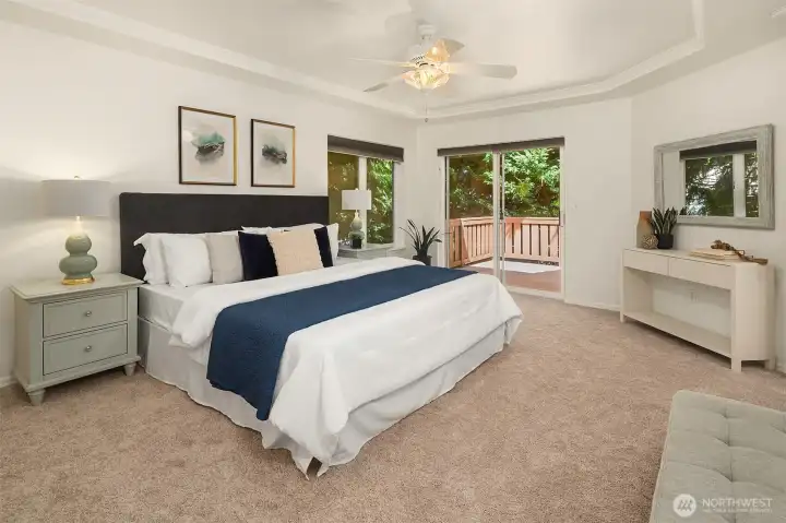 Primary bedroom with private balcony.