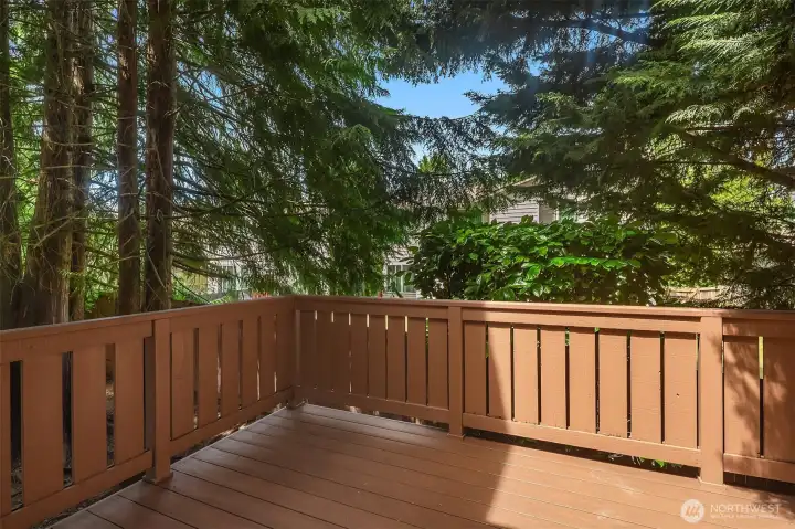 Private balcony off of the primary bedroom accessible via sliding glass doors.