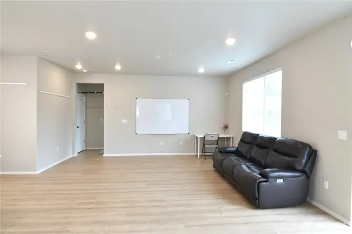 living room with primary bedroom