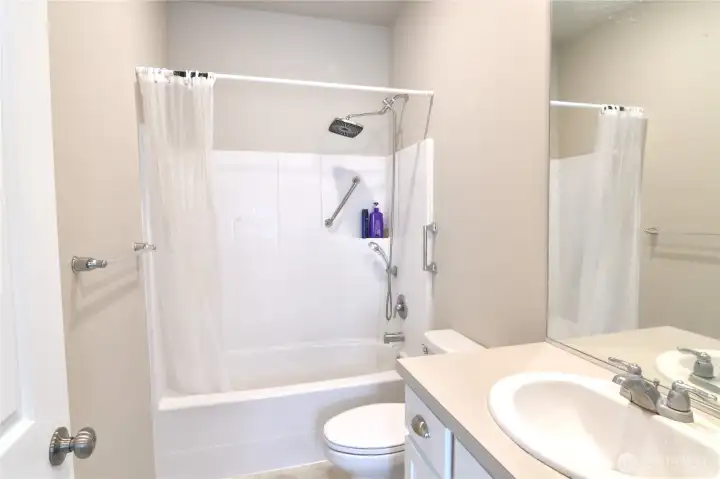 full bathroom next to hallway