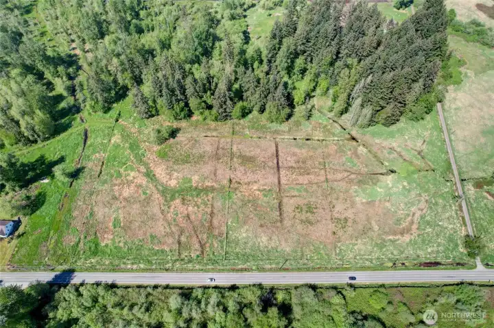 Arial photo of the 15 acre vacant land parcel that is included in the sale