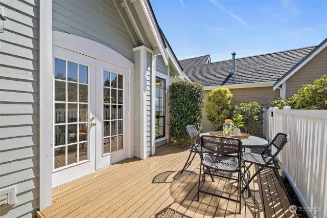 Enjoy outdoor dining with lots of privacy on this wonderful deck.