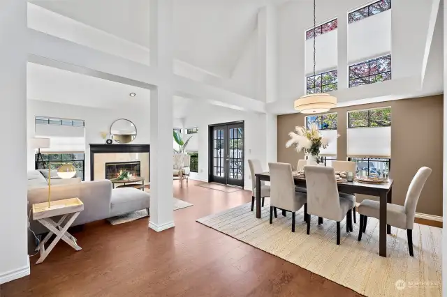 Soaring vaulted ceilings, and abundant windows allow natural light to flow throughout the main level.