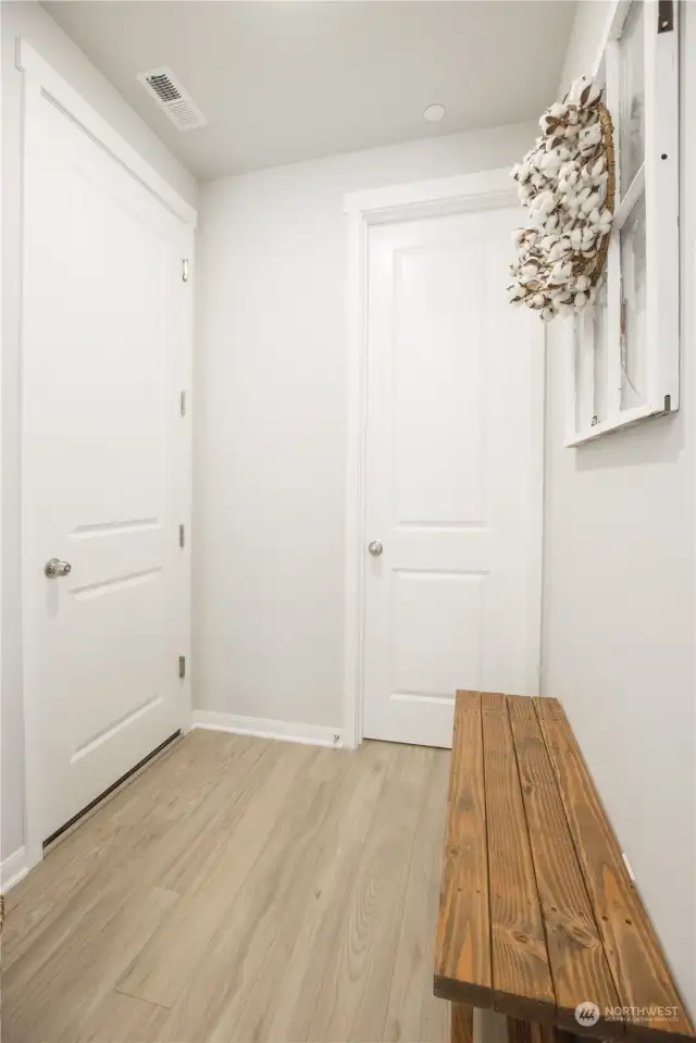 Mud Room w/ access to 2 Bay Garage and Walk-In Pantry